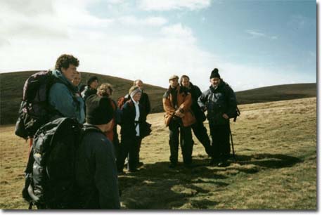 Walkers discussing their route